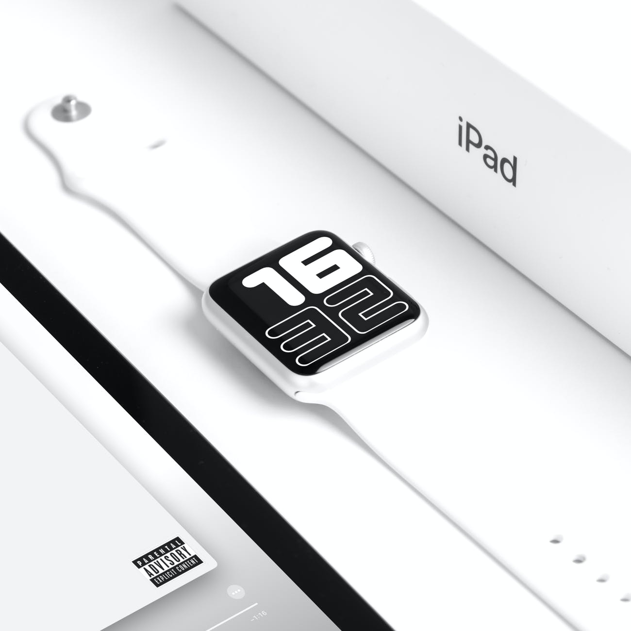 an apple watch on a white surface